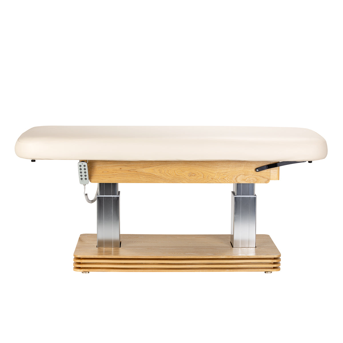 Cream SPA lounger Sillon Comfort with light brown base, used as beauty salon furniture for relaxing treatments.