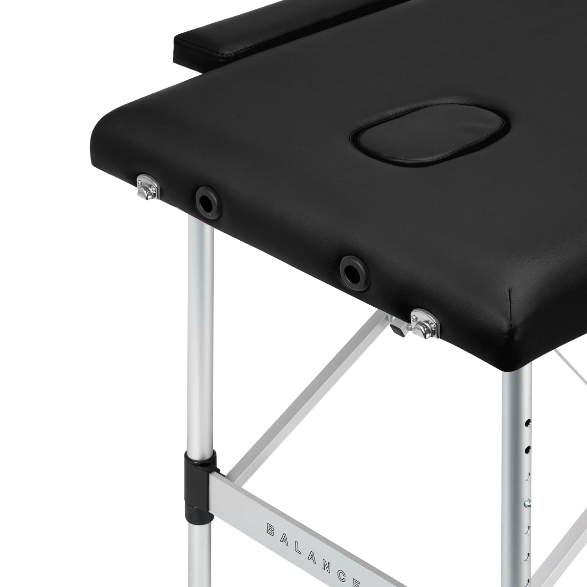Black BALANCE aluminium folding massage table with two segments, lightweight and portable massage furniture for professional use.
