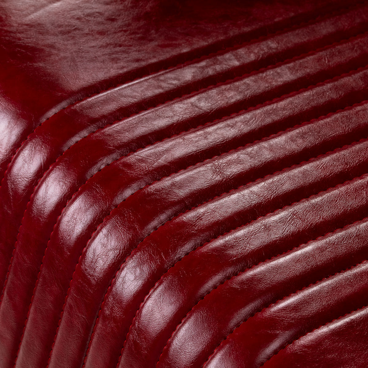 Red barber chair Gabbiano Royal X padded armrests chrome details