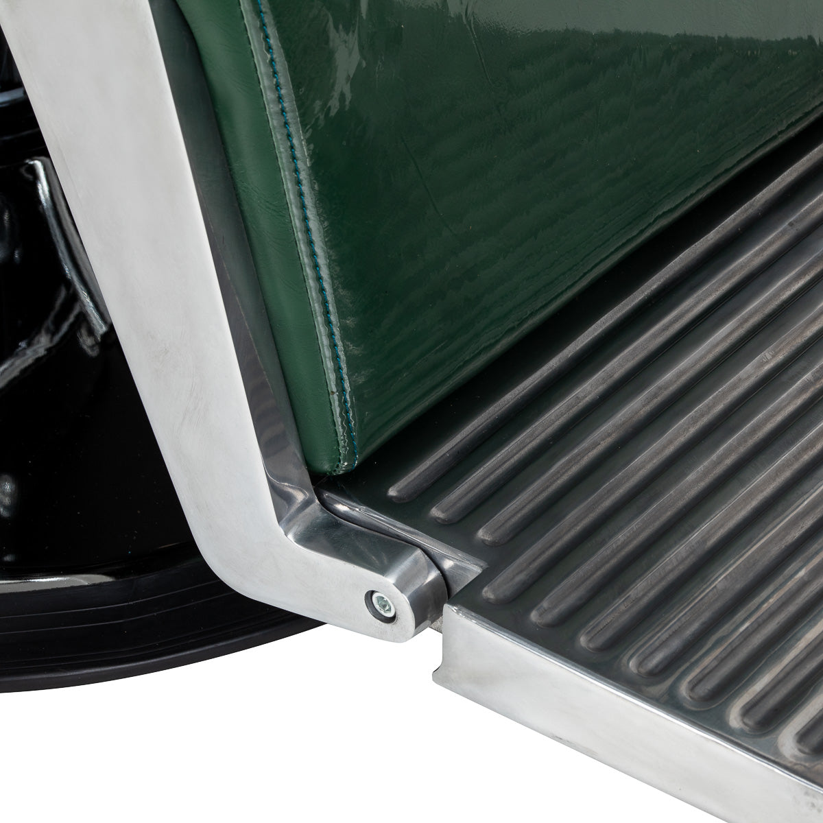 Green Gabbiano Royal X barber chair with padded seat, backrest, and armrests, designed for professional barbershop furniture.