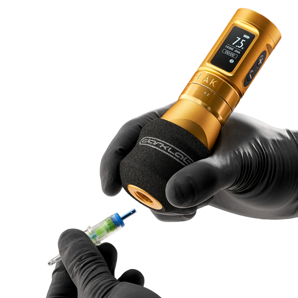FK Irons Ergo disposable foam grip covers shown on a tattoo machine for comfortable, hygienic grip during tattooing.