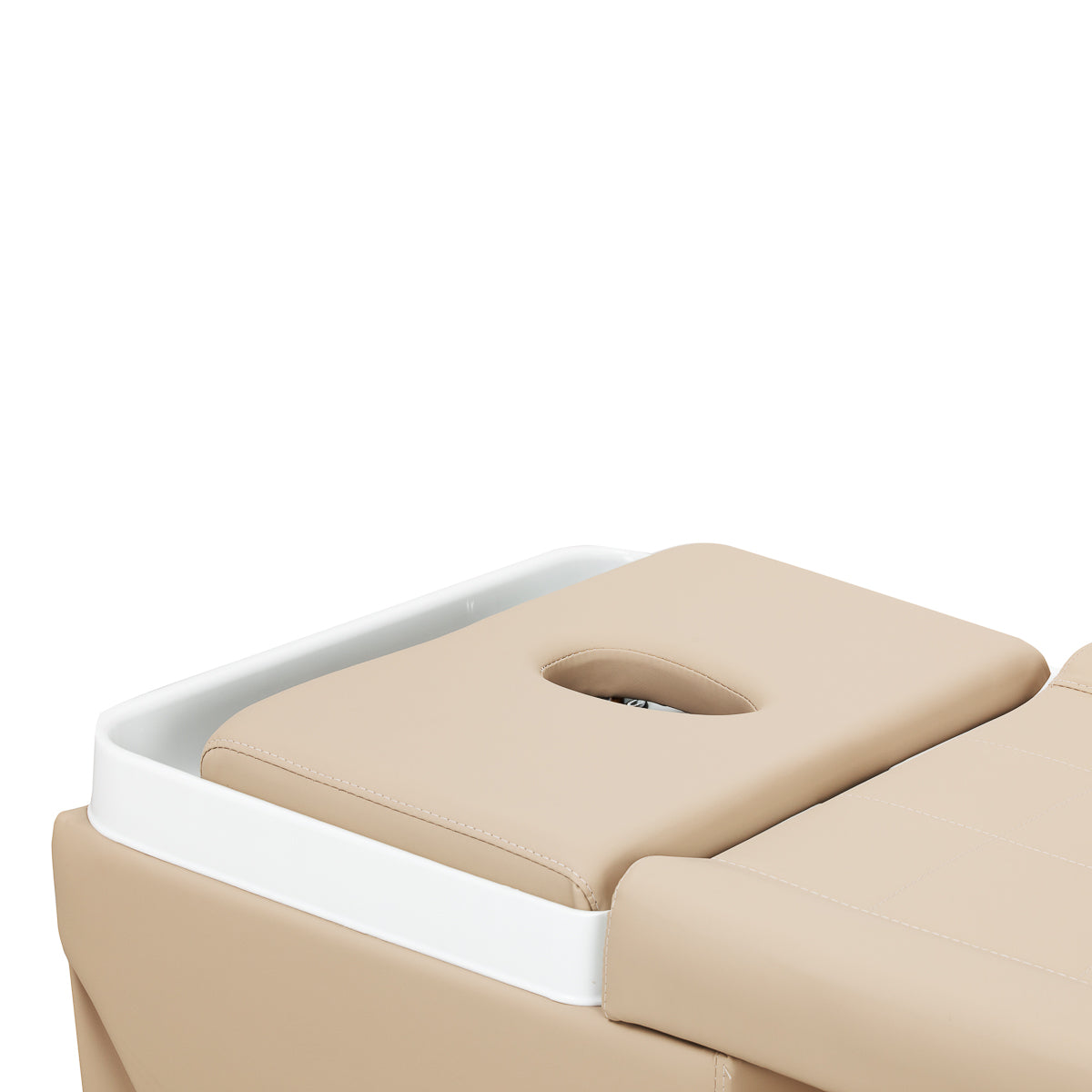 Gabbiano Head Spa Maldives beige hair washing bed with cushioned headrest for comfortable hair treatments.