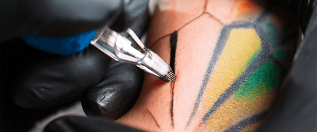 How Deep Does a Tattoo Needle Go?