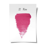 Bottle of The Pigment 11 Kiss Pigment in 15ml container, featuring a clear label and purple and pink color accents.