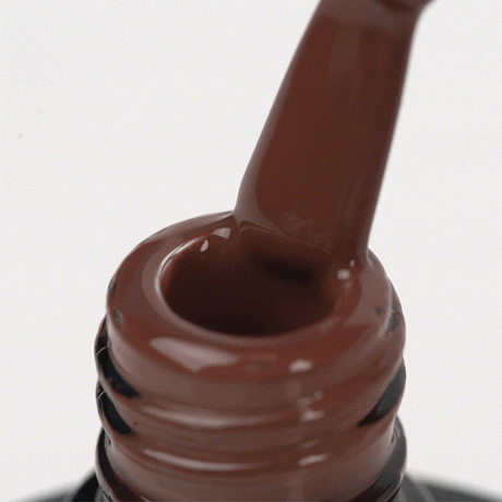OCHO NAILS Hybrid nail polish in brown 807, 5g bottle with smooth, glossy finish and natural lighting highlighting the color