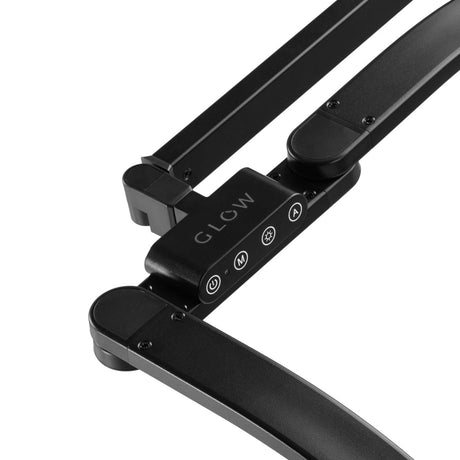GLOW Glow L05 manicure treatment lamp, black bent tabletop LED lighting for professional nail curing, close-up view
