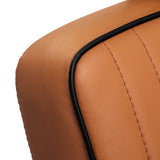 Gabbiano Visionerio barber chair in light brown leather with chrome armrests, designed for barbershop furniture.