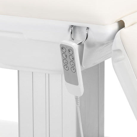 Electric cosmetic chair SILLON Eclipse with white upholstery and four actuators, designed for beauty salon comfort and functionality.