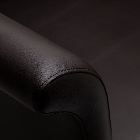 Brown Gabbiano Lucca hairdressing chair with padded seat and backrest, adjustable height, and sleek modern design.