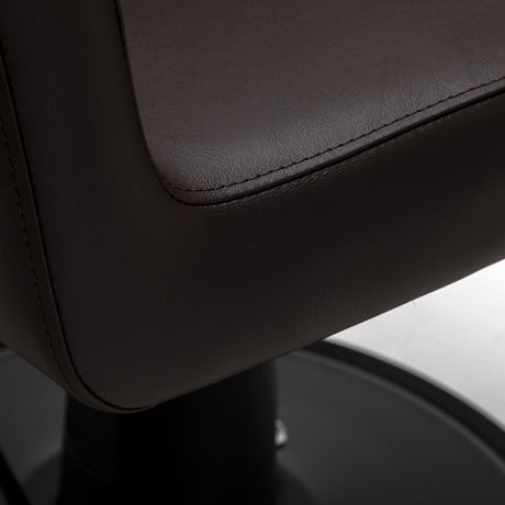 Gabbiano Lucca brown hairdressing chair with padded seat and backrest, adjustable height, and armrests for salon styling.
