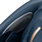 Sakura 3D Sakura Maximus 809 grey-blue massage chair with padded upholstery and built-in massage rollers, designed for comfort and relaxation.