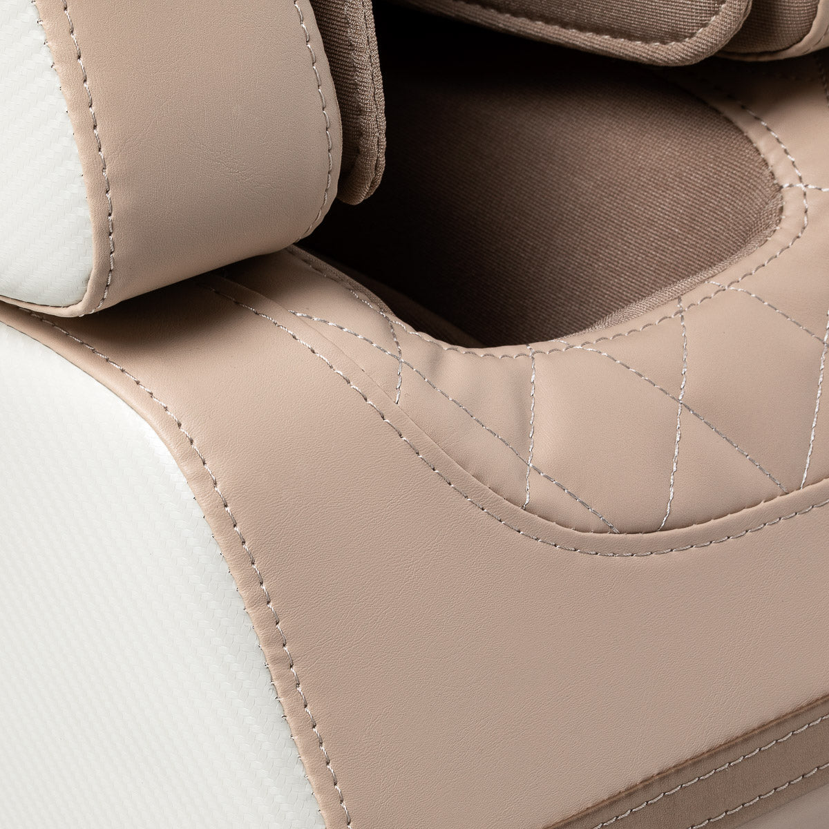 White Sakura Prime 101 massage chair from SAKURA, featuring padded upholstery and built-in massage controls.