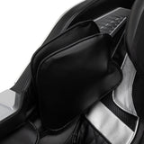 Black Sakura Prime 108 massage chair with padded armrests and built-in control panel, designed for comfortable relaxation.