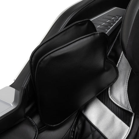 Black Sakura Prime 108 massage chair with padded armrests and built-in control panel, designed for comfortable relaxation.