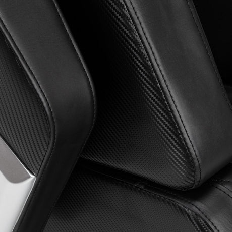 Black Sakura Prime 108 massage chair with padded armrests and sleek design, showcasing its modern massage furniture features.