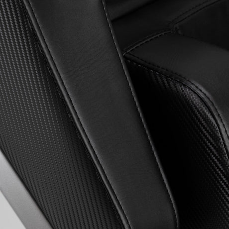 Black Sakura Prime 108 massage chair with padded armrests and built-in control panel, showcasing a modern massage furniture design.