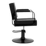 Black Hairdressing Chair from Hair System Studio Noir, featuring sleek design and comfortable upholstery for salon use.