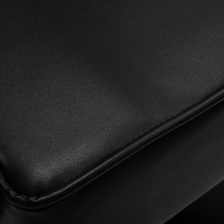 Black Hair System hairdressing chair in a professional salon setting with a sleek, modern design and adjustable features.