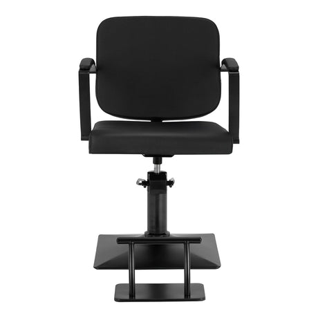 Black HAIR SYSTEM Hairdressing chair with padded seat and backrest, adjustable height, and modern design.