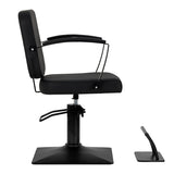 Black Hair System Edge hairdressing chair with padded seat and adjustable height, designed for salon styling and comfort.