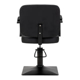Black HAIR SYSTEM Edge hairdressing chair with cushioned seat and adjustable height for salon use.
