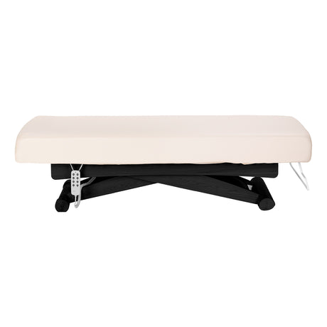 Cream SPA lounger Sillon Siesta with black base, comfortable beauty salon furniture for relaxation and professional use.