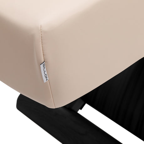 Cream SPA lounger Sillon Siesta with black base, comfortable beauty salon furniture for relaxation and professional use.