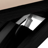 Cream SPA lounger Sillon Siesta with black base, used as beauty salon furniture for relaxation and treatments.