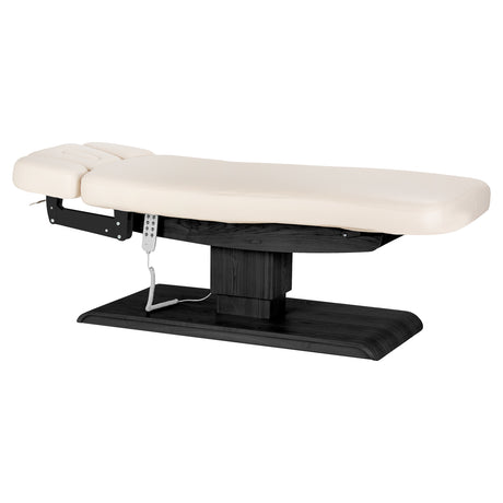Cream-colored SPA lounger Sillon Relax with black base, designed for beauty salon comfort and professional use.