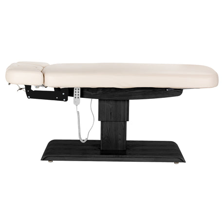Cream SPA lounger Sillon Relax with black base, modern beauty salon furniture for comfortable client seating.