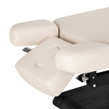 Cream-colored SPA lounger Sillon Relax with black base, designed for beauty salon furniture, featuring cushioned seating and adjustable backrest.