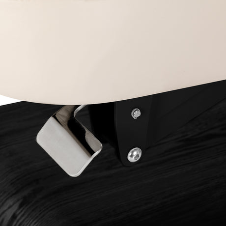 Cream SPA lounger Sillon Relax with black base, ergonomic beauty salon furniture for comfortable client relaxation.
