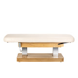 Cream SPA lounger Sillon Comfort with light brown base, beauty salon furniture, ergonomic design for client comfort.