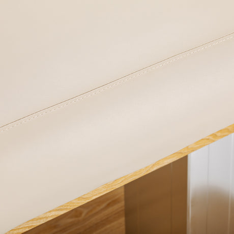 Cream-colored SPA lounger Sillon Comfort with light brown base, ideal for beauty salon furniture and relaxation.
