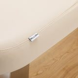 Cream-colored SPA lounger Sillon Comfort with light brown base, ideal for beauty salon furniture, featuring plush cushioning and adjustable design.