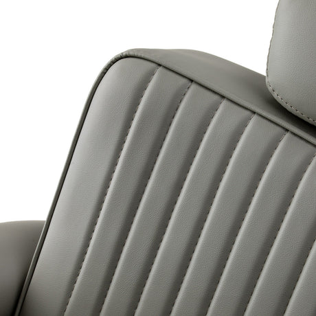 Gabbiano Visionerio barber chair with grey upholstery and chrome frame, designed for barbershop furniture.