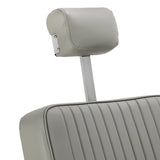 Gabbiano Visionerio barber chair with grey upholstery and chrome frame, designed for professional barbershop furniture.
