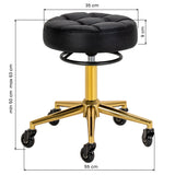 Gabbiano D054G gold and white hairdressing stool with adjustable height for beauty salon use.
