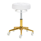 Gabbiano D054G gold and white hairdressing stool with adjustable height and cushioned seat, designed for beauty salons.