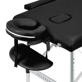 BALANCE aluminium folding massage table with two segments in black, featuring a sturdy, portable design for professional massage therapy