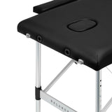 Black BALANCE aluminium folding massage table with two segments, lightweight and portable massage furniture for professional use.