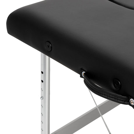 Black BALANCE aluminium folding massage table with two segments, featuring a sturdy, lightweight design for professional massage therapy.