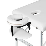 White BALANCE aluminium folding massage table with 3 segments, lightweight and adjustable for professional massage therapy.