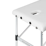 BALANCE aluminium folding massage table with three segments in white, designed for professional massage therapy sessions.