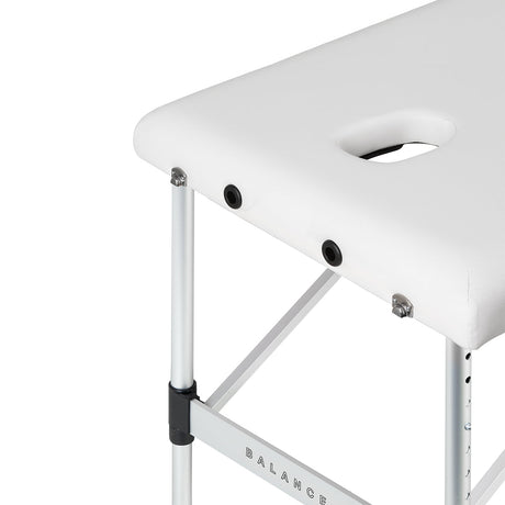 BALANCE aluminium folding massage table with three segments in white, designed for professional massage therapy sessions.