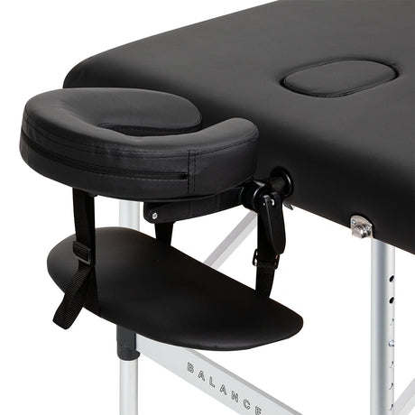 BALANCE aluminium folding massage table with three segments in black, lightweight and portable for professional massage therapy.