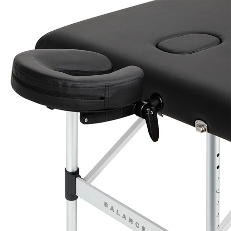 BALANCE aluminium folding massage table with three segments in black, featuring adjustable sections and portable design.