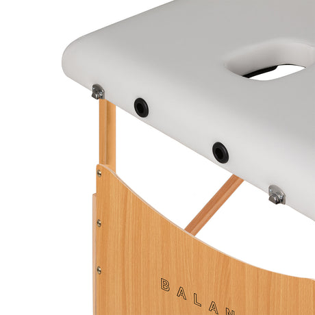 White BALANCE wooden folding massage table with 3 segments, measuring 190x70 cm, designed for professional massage therapy.