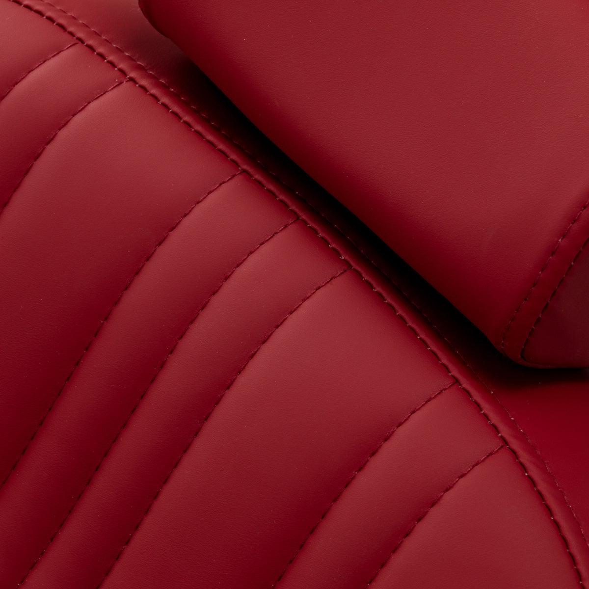 Red Gabbiano Elias barber chair with plush upholstery and adjustable features, ideal for professional barbershop furniture.