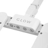 White Glow L05 bent manicure treatment lamp on tabletop, featuring adjustable LED lighting for professional nail curing.